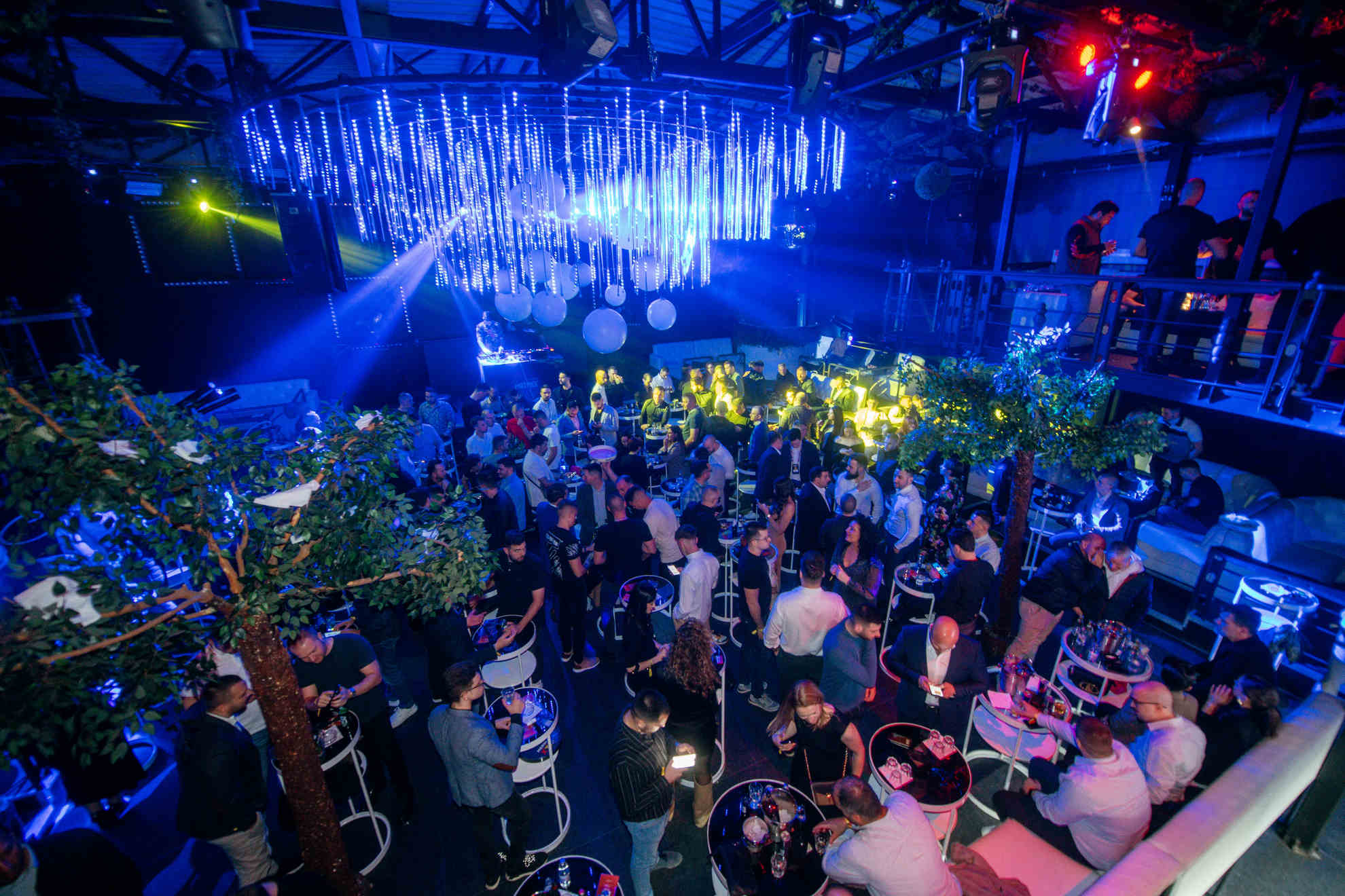 A number of people in a night club during an event
